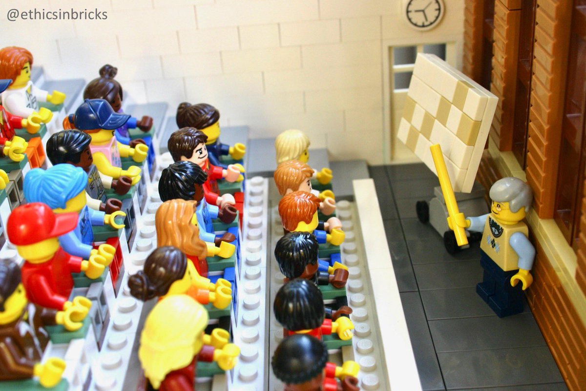 LEGO scene: lecture room with inclusive set of students and (grey haired) teacher